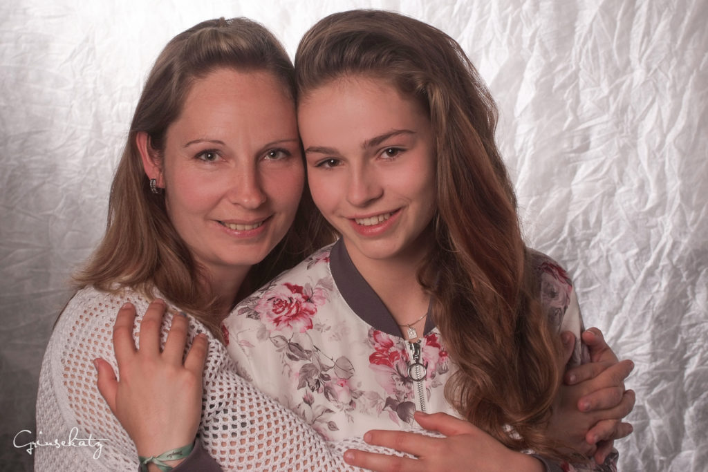 Familie posiert für ein Foto
